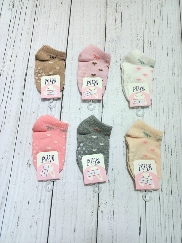 Hypoallergenic cotton socks for girls (ages 1–2) featuring heart and bow designs.