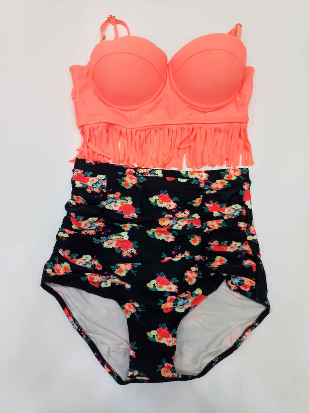 Women's two-piece swimsuit available in various sizes; stylish, flattering fit, and chlorine-resistant