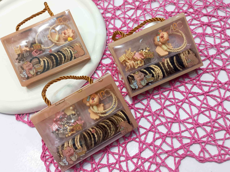 Pack of novelty hair ties and clips for girls