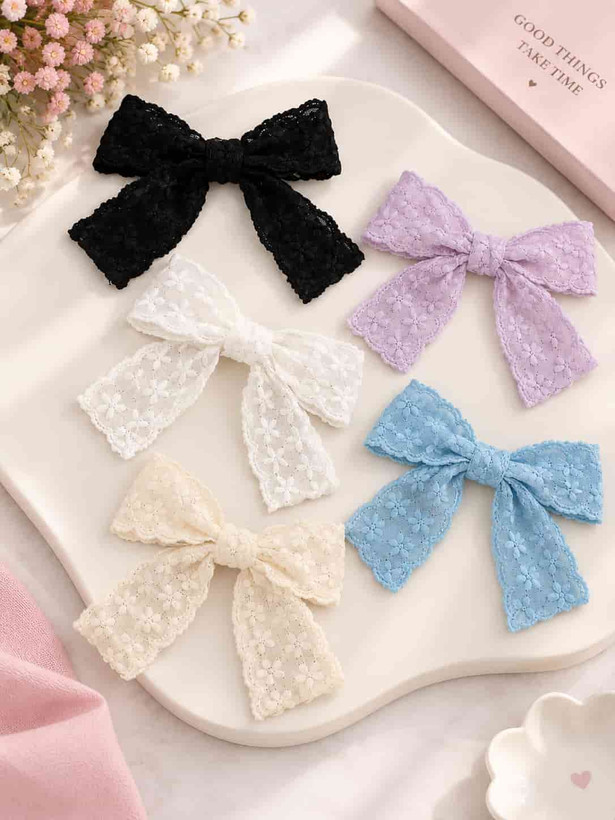 Girls' eyelet-embroidered hair bow